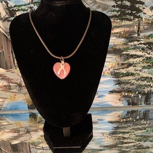 Pink Heart Pendant With Silver Tone Crossed Ribbion Symbol Necklace